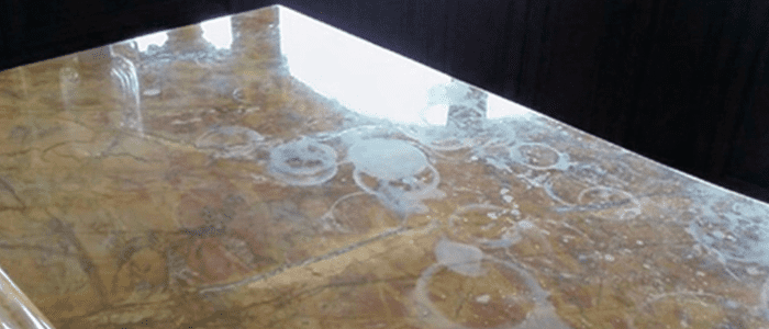 remove etching from marble countertops