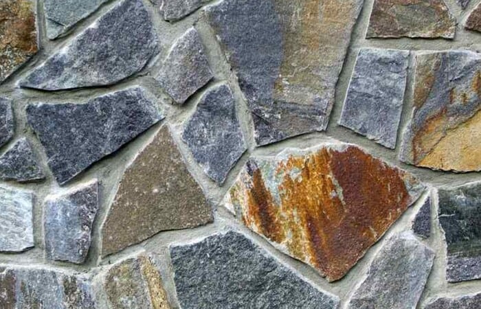 asymmetrically shaped stone wall